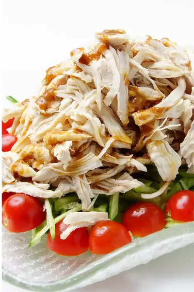 Bang bang chicken with sesame chili sauce close-up
